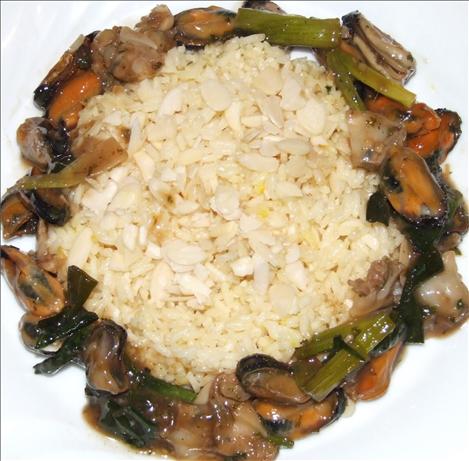 Mussels and Pipis in Oyster Sauce. Photo by Peter J
