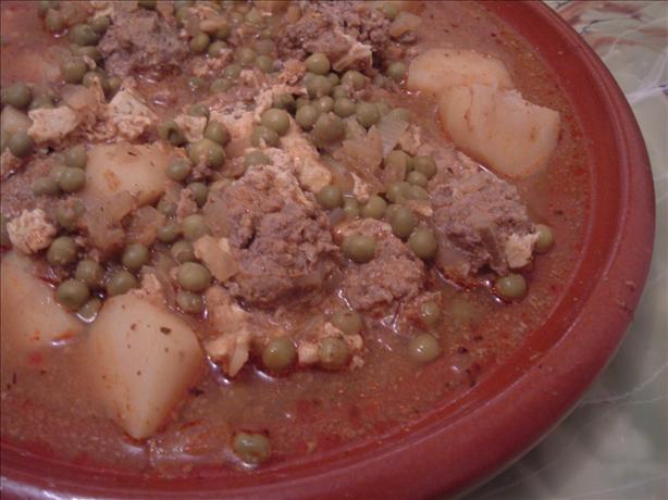 Kefta Tajine (Moroccan Spiced Meatballs W/ Eggs in Tomato Sauce). Photo by Um Safia