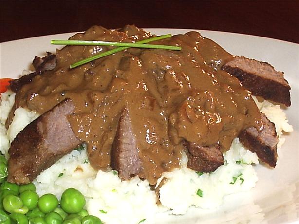 Bourbon, Brown Sugar Flank Steak W/ Garlic-chive Mashed Potatoes. Photo by Fairy Nuff