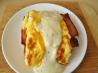 Brunch Eggs With Herbed Cheese Sauce. Recipe by PaulaG