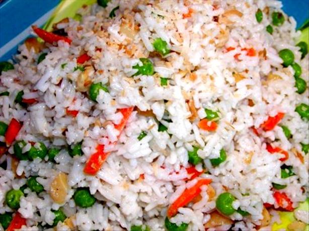 Coconut Rice Erupting With Spices, Nuts & Peas. Photo by Rita~