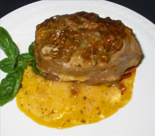 Pesto-Stuffed Pork Chops. Photo by Caroline Cooks