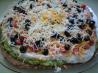 Layered Bean Taco Dip. Recipe by Kittencalskitchen