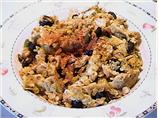 Scrambled eggs and olives