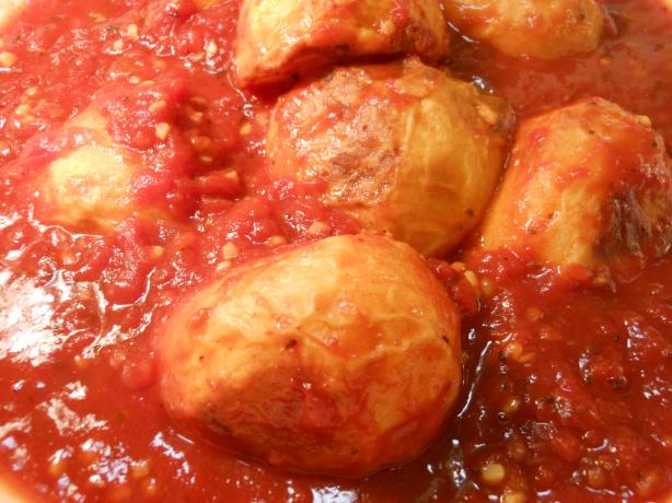 Roasted Potatoes With Spicy Tomatoes. Photo by JustJanS