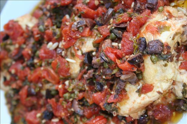 Chicken Thighs With Tomatoes, Olives and Capers. Photo by Kymmarie