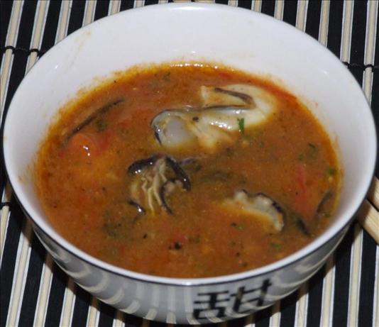 Steamed Oysters in Tomato Vinaigrette Served in Sake Cups. Photo by Peter J