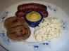 Brats With Glazed Red Onions