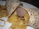 Beer-Bathed Brats With Sauerkraut and Apples