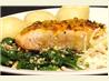 Down-Under Salmon With Citrus Saffron Sauce over Greens