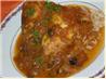 Chicken Stewed With Olives and Onions