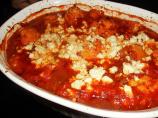 Kounoupithi (Baked Cauliflower With Feta and Tomato Sauce)