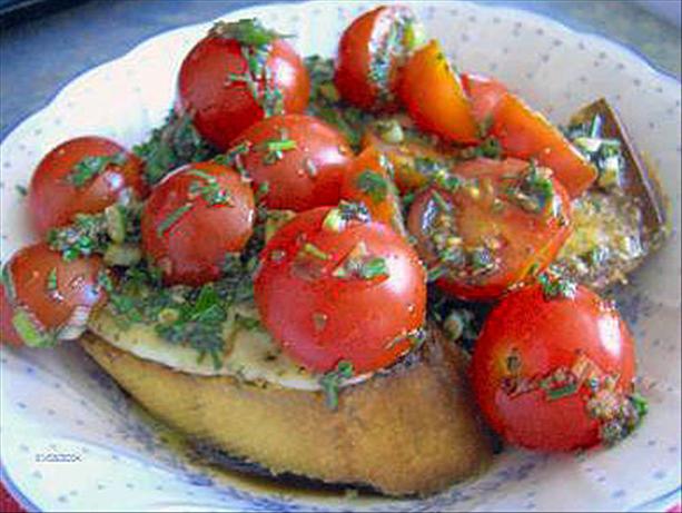 Cherry Tomatoes on Provolone Garlic Bread. Photo by Derf