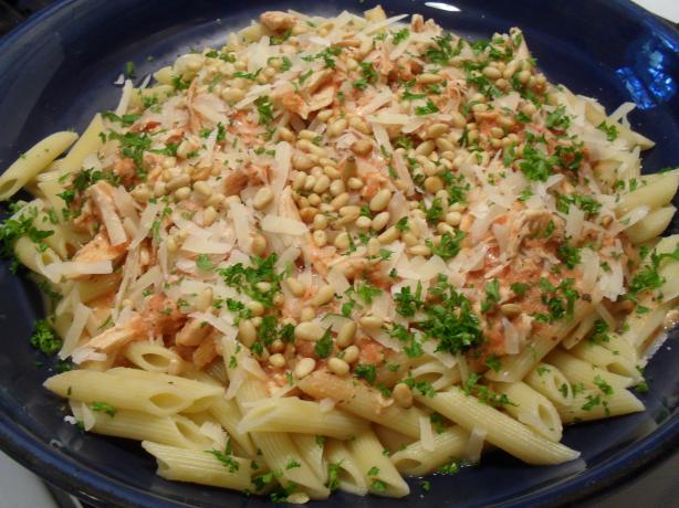 Chicken and Tomato Sauce With Basil and Pine Nuts on Pasta. Photo by vivmom