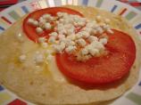 Thin Crisp Tortilla Pizzas With Tomatoes & Goat Cheese