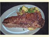 Grilled Rib-Eye of Beef With Warm Potatoes, Bacon, and Leeks. Photo by duonyte
