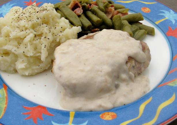 Pork Chops Smothered in Mushroom Gravy. Photo by lazyme