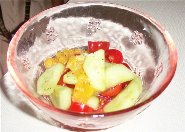 Orange Tomato Cucumber Salad With Orange and Maple Dressing. Photo by Baby Kato