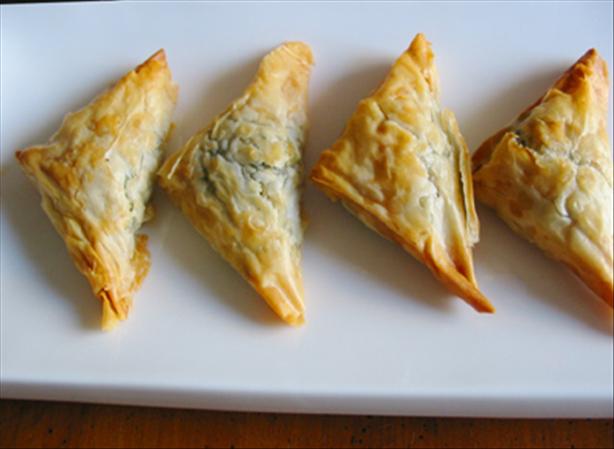 Kittencal's Greek Spinach and Feta Puff Pastry Triangles. Photo by Caroline Cooks