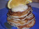 Banana Macadamia Nut Pancakes With Orange Butter