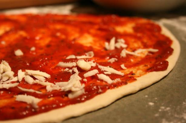 Thin-Crust Pizza. Photo by lilsweetie