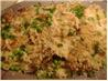 Pork Chops over Parmesan Rice With Peas. Recipe by Marie