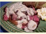 Steak Served on Parmesan Toasts With Sour Cream/Onion/Garlic Sau