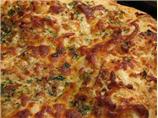 Focaccia With Cheese and Onion Topping