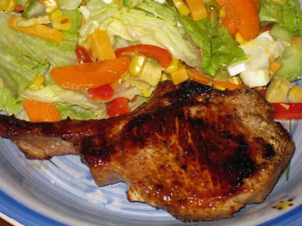Grilled Bourbon-Marinated Pork Chops or Pork Tenderloins. Photo by Heydarl