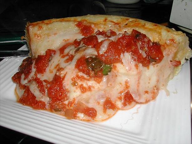 Deep Dish Spinach and Mozzarella Pizza. Photo by MarraMamba
