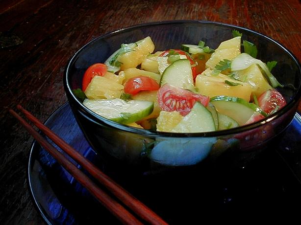 Cucumber, Tomato, and Pineapple Salad With Asian Dressing. Photo by ms_bold