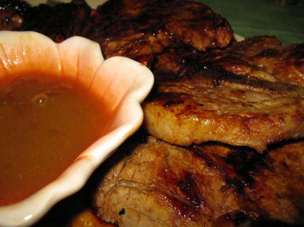 Grilled Hoisin Glazed Pork Chops With Plum Dipping Sauce. Photo by threeovens