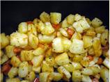 Pan-Browned Potatoes With Red Pepper and Whole Garlic