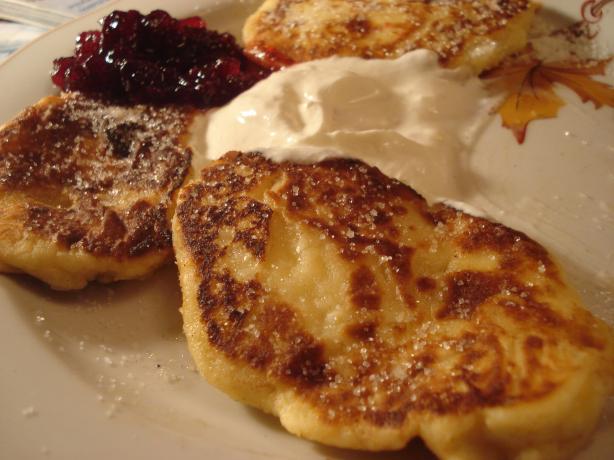 Sirniki (Russian Cheese Pancakes). Photo by Sartreana