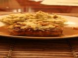 Pork Chops With Caramelized Onions and Smoked Gouda