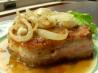 Pork Chops With Caramelized Onions and Smoked Gouda