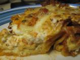 Cheese Stuffed Manicotti in Meat Sauce