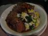 Smothered Oxtails over Spinach and Sweet Corn Mash