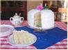Coconut Layer Cake With Lemon Filling and Marshmallow-Like Frost. Recipe by Artemia