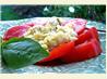 Scrambled Eggs over Fresh Sliced Tomatoes and Basil