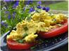 Scrambled Eggs over Fresh Sliced Tomatoes and Basil
