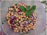 Chickpea and Spinach Salad With Cumin Dressing and Yogurt Sauce. Photo by Whisper