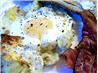 Baked Eggs on a Bed of Potatoes With Bacon