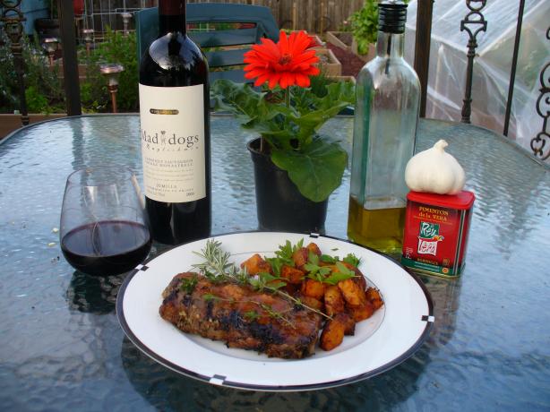Grilled Porterhouse Steak With Paprika-Parmesan Butter. Photo by IngridH