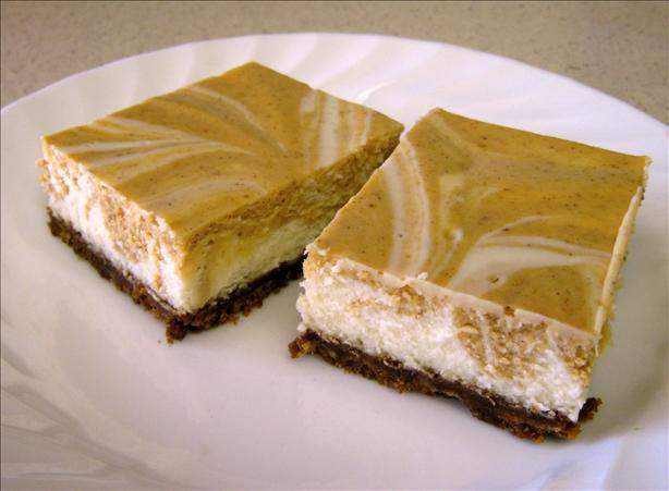 Marbled Pumpkin Cheesecake Bars With a Gingersnap Crust. Photo by Chef Itchy Monkey