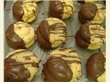 Chocolate Dipped Peanut Butter Sandwich Cookies. Photo by Karamia
