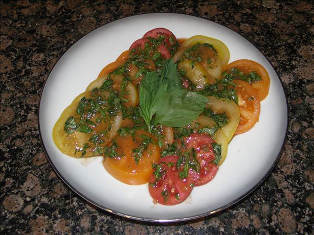 Tomato Salad With Fresh Basil Dressing. Photo by Juenessa