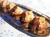 Rogene's Chocolate Dipped Coconut Macaroons. Recipe by Hill Family