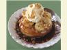 Warm Doughnuts a La Mode With Bananas and Spiced Caramel Sauce. Recipe by Bev