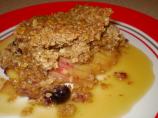 Apple-Cranberry Crisp With Warm Toffee Sauce. Photo by RonaNZ
